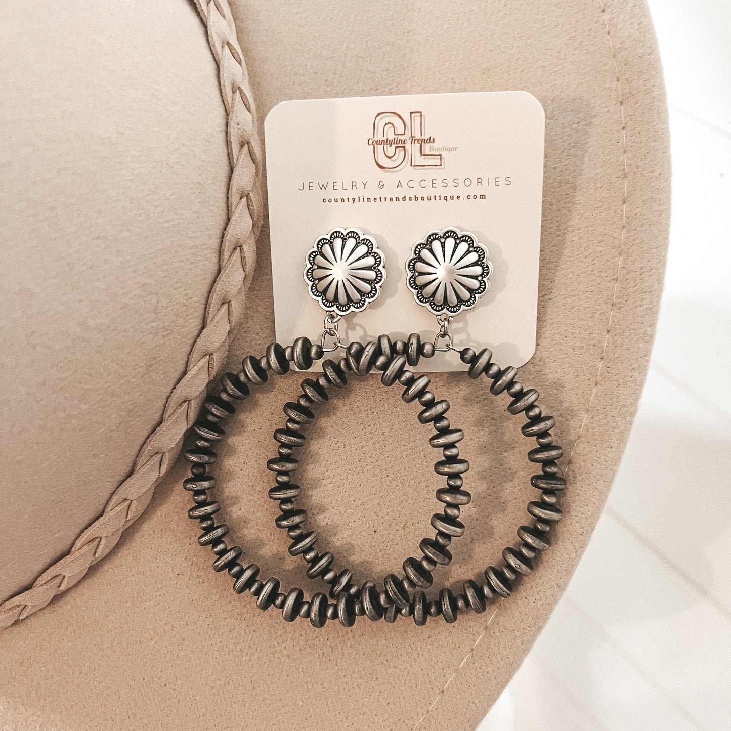 Big conch hoop earrings