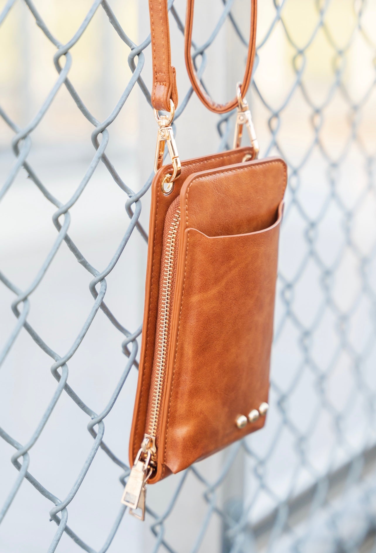 Tan leather phone bag