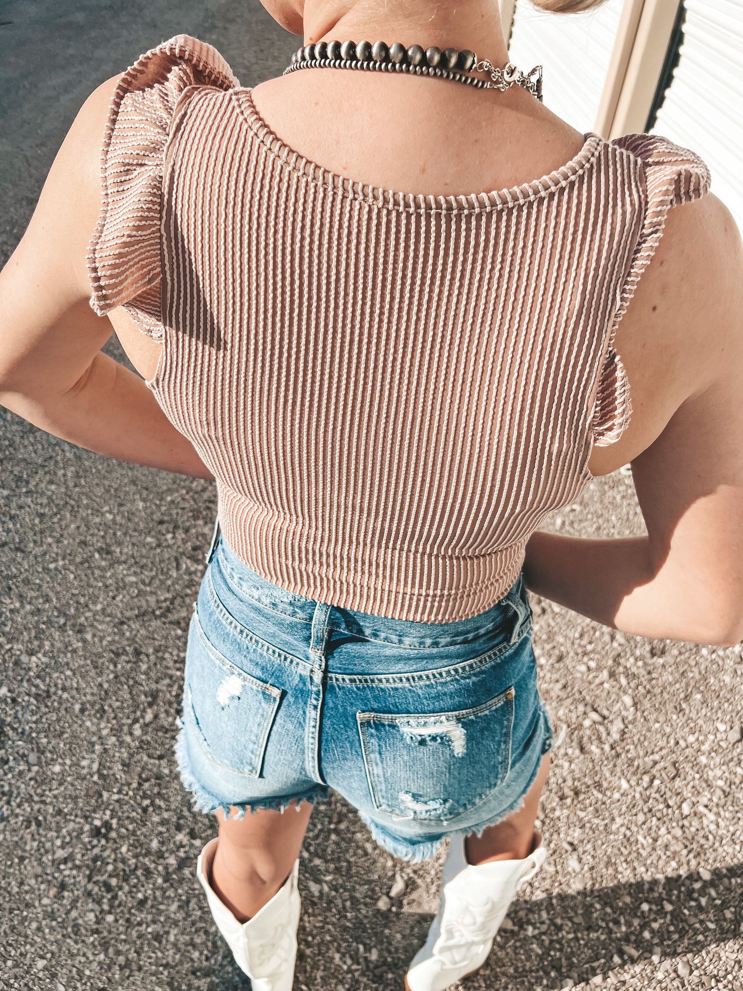 All about the Ruffles Body Suit
